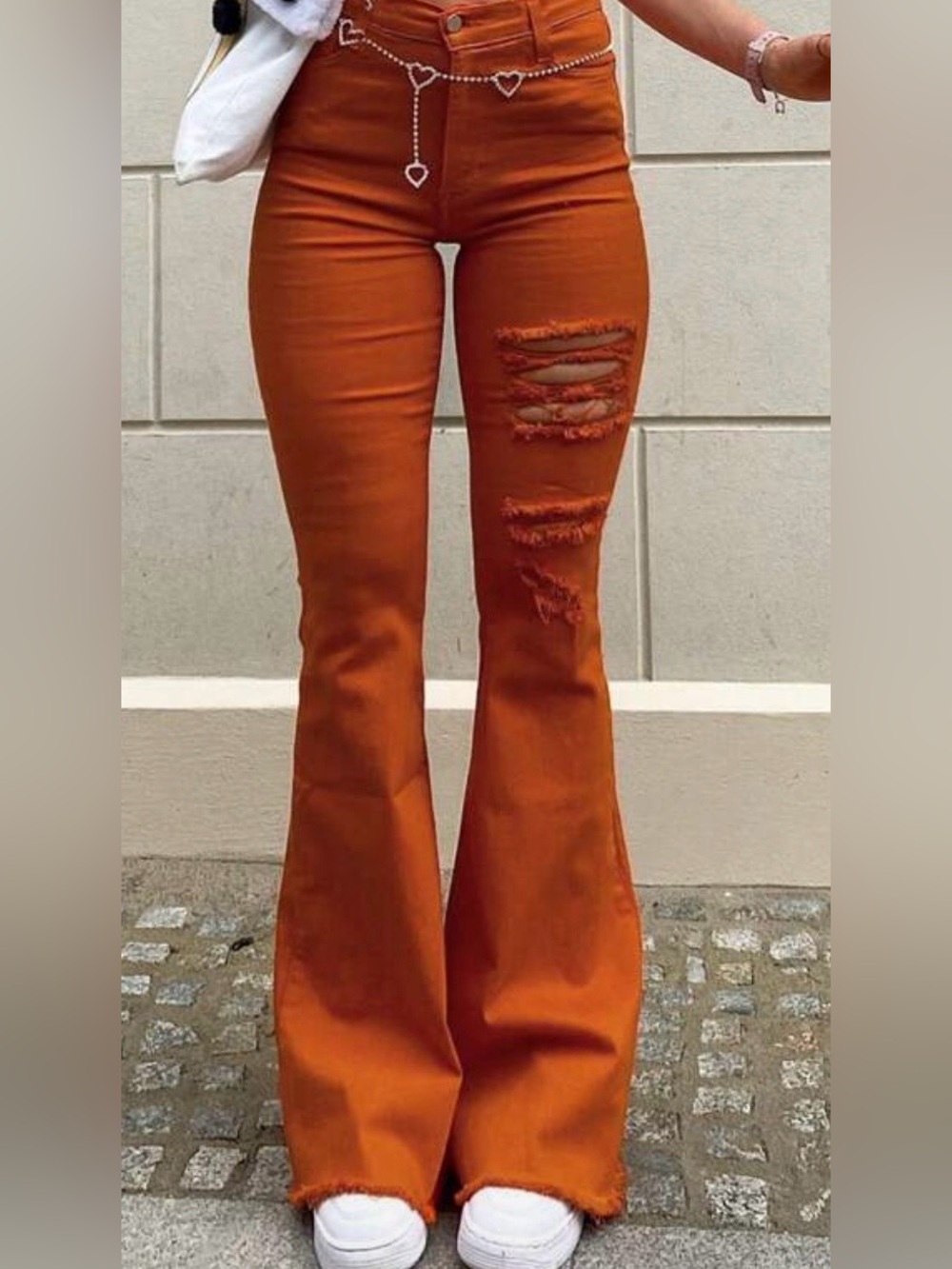 High-Waist Distressed Flared Jeans in Rust Orange